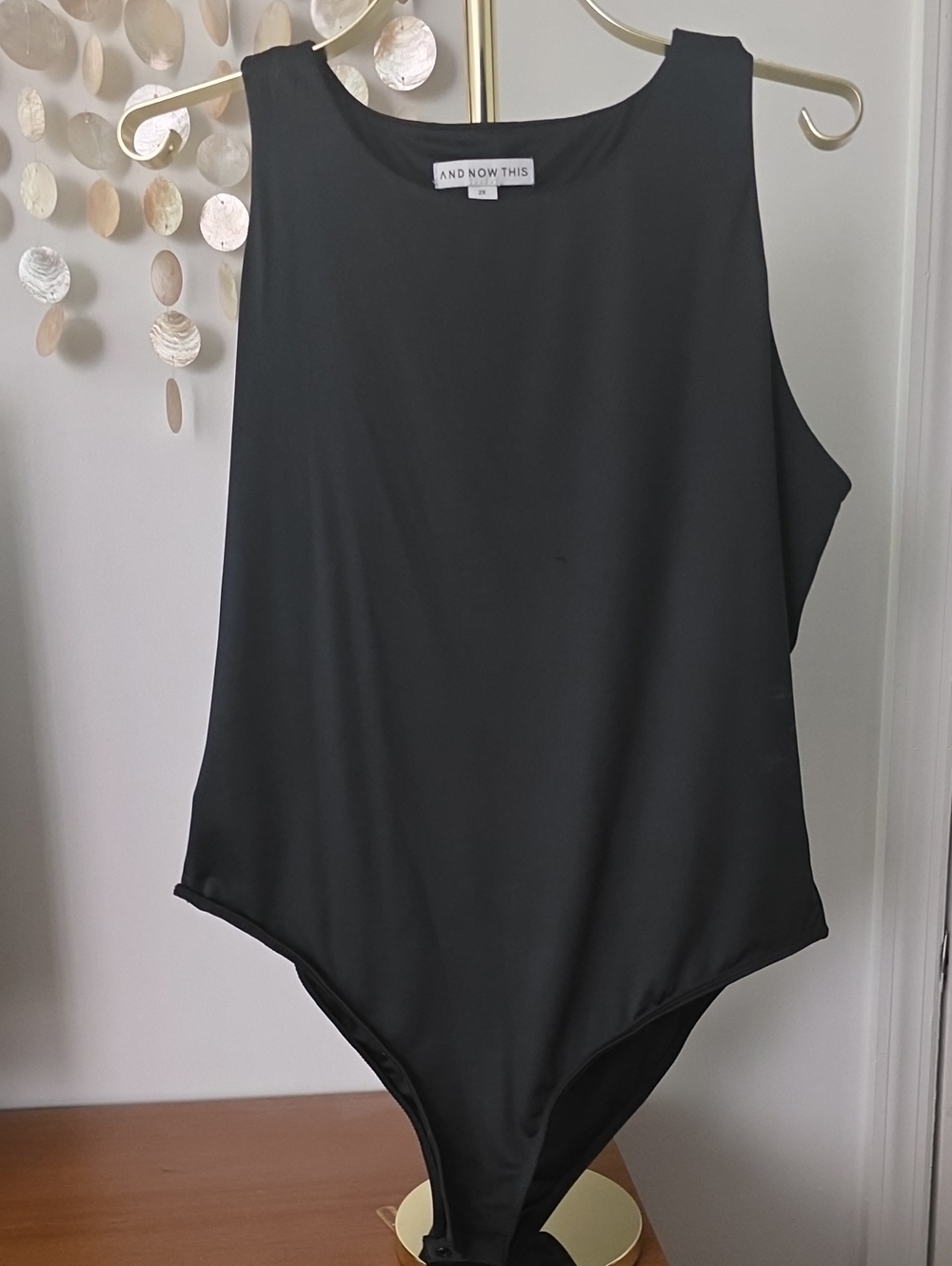 And Now This Black Sleeveless Bodysuit